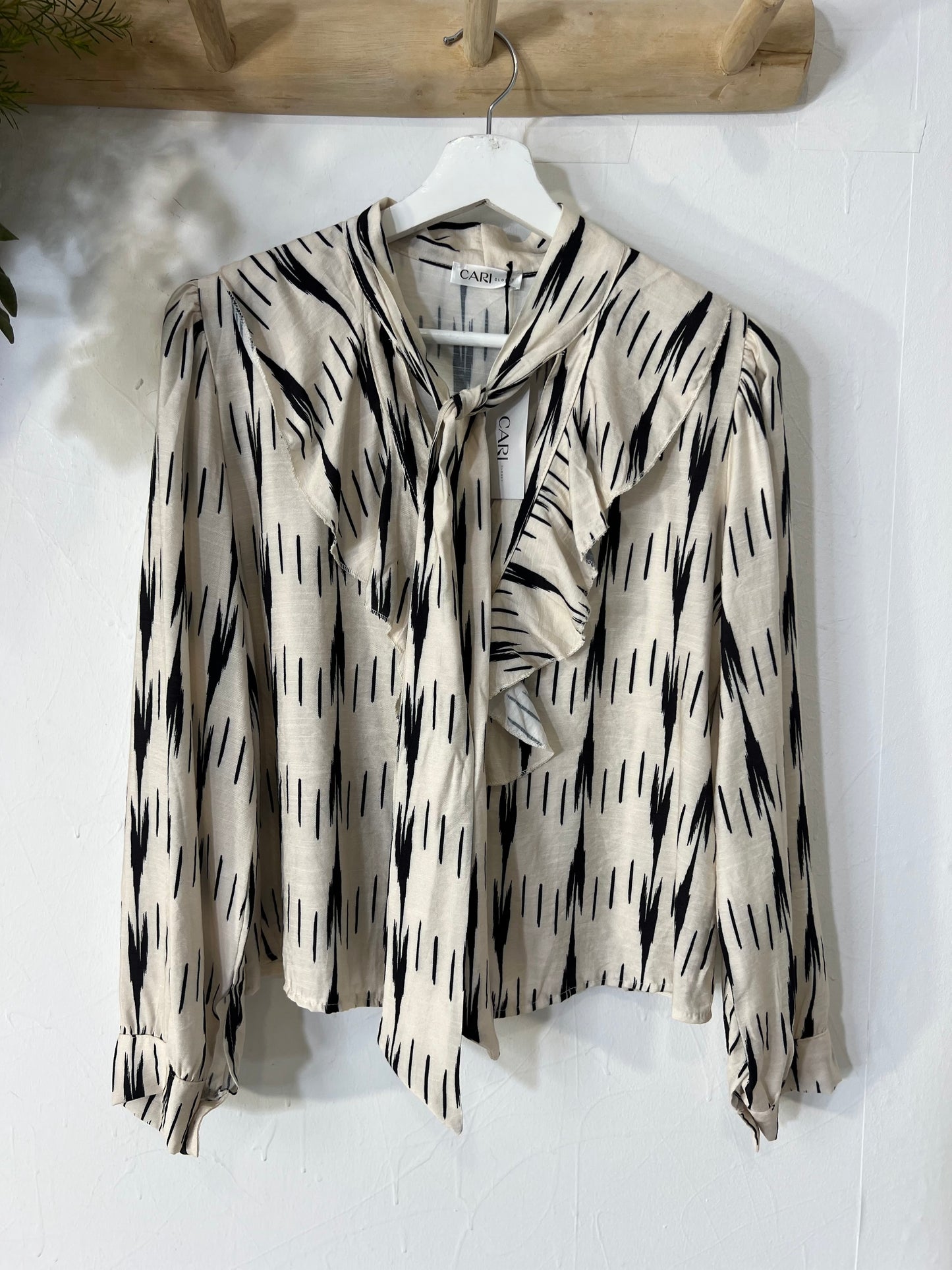 Blusa Botero